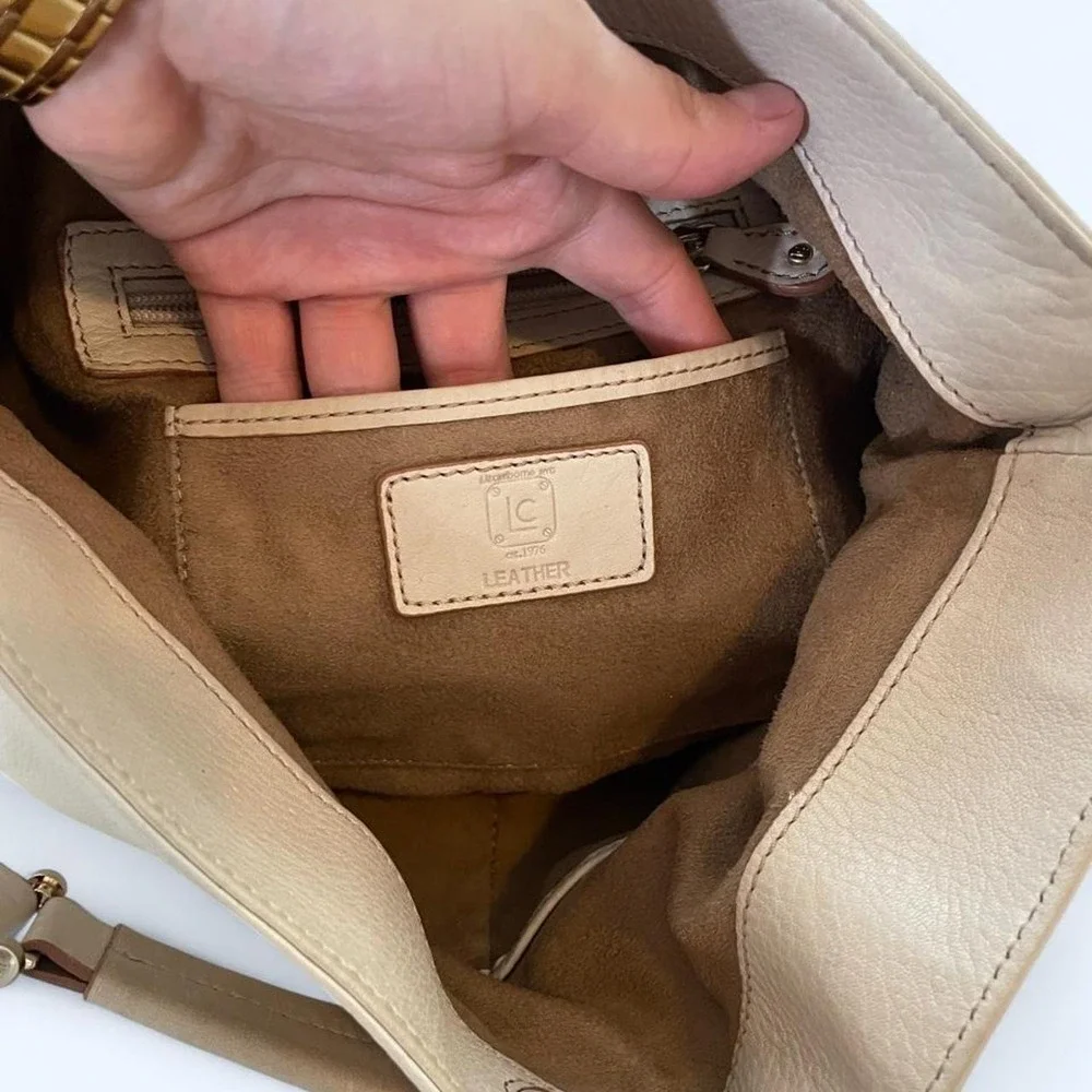 Cream leather vintage shoulder bag with gold hardware by Liz Claiborne